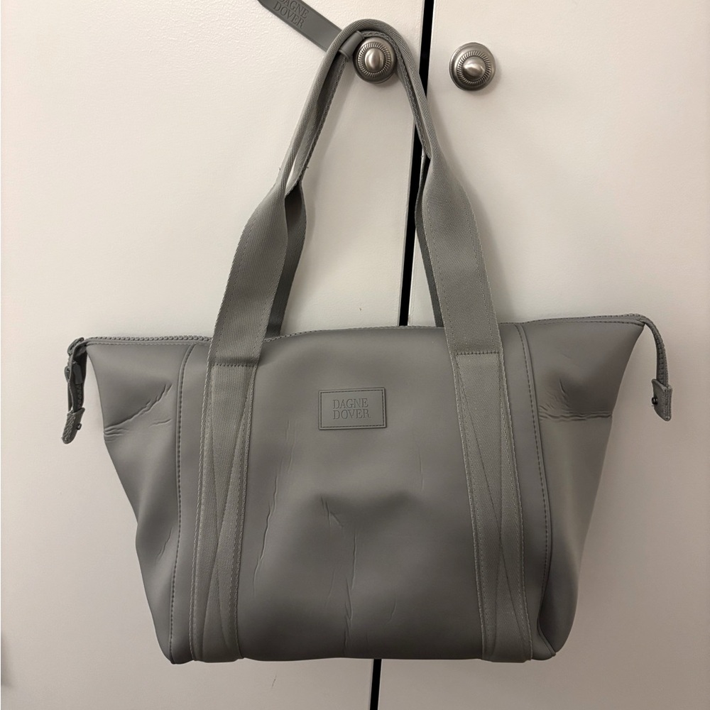 Never worn- tags removed. Dagne Dover LANDON NEOPRENE CARRYALL BAG- silver